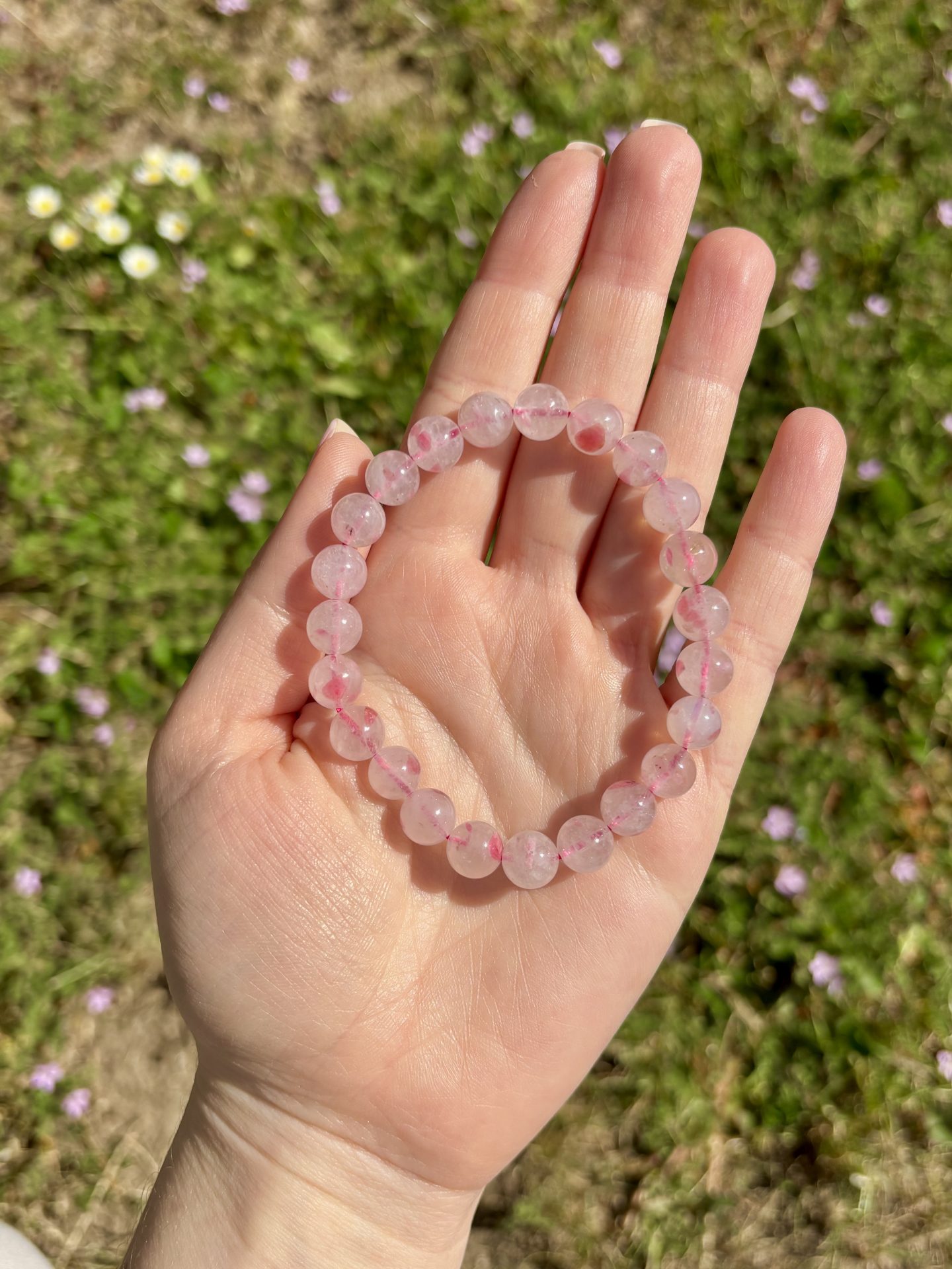 Bracelet Sphères Rhodonite sur Quartz AA+