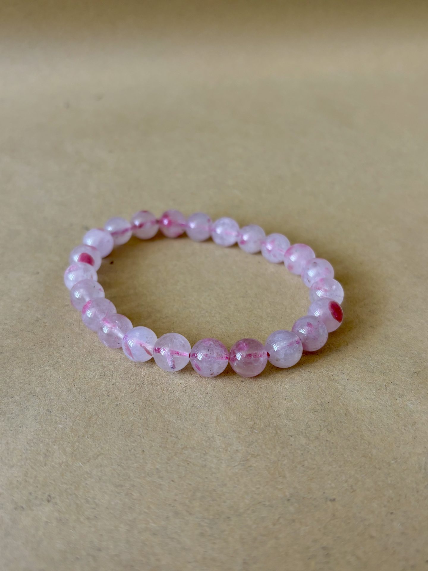 Bracelet Sphères Rhodonite sur Quartz AA+ – Image 5