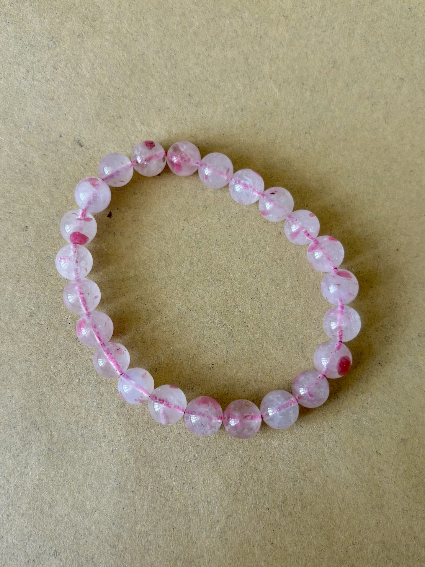 Bracelet Sphères Rhodonite sur Quartz AA+ – Image 6